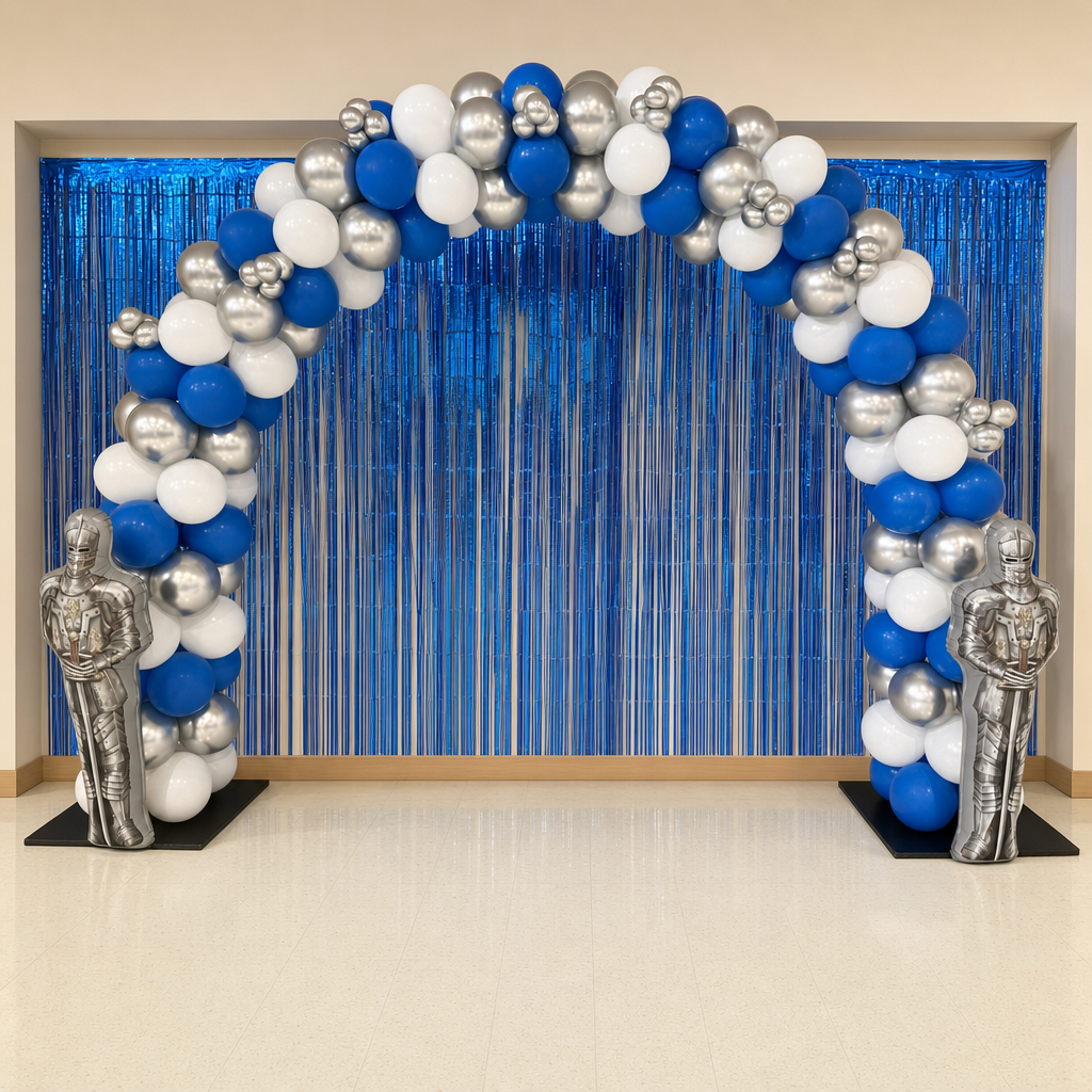 Blue and silver balloon arch with a knight backdrop