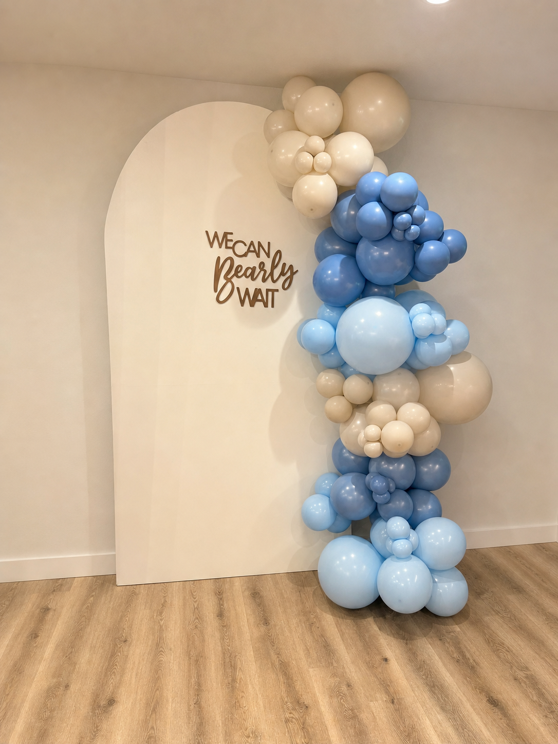 Blue and neutral bear themed baby shower balloon backdrop