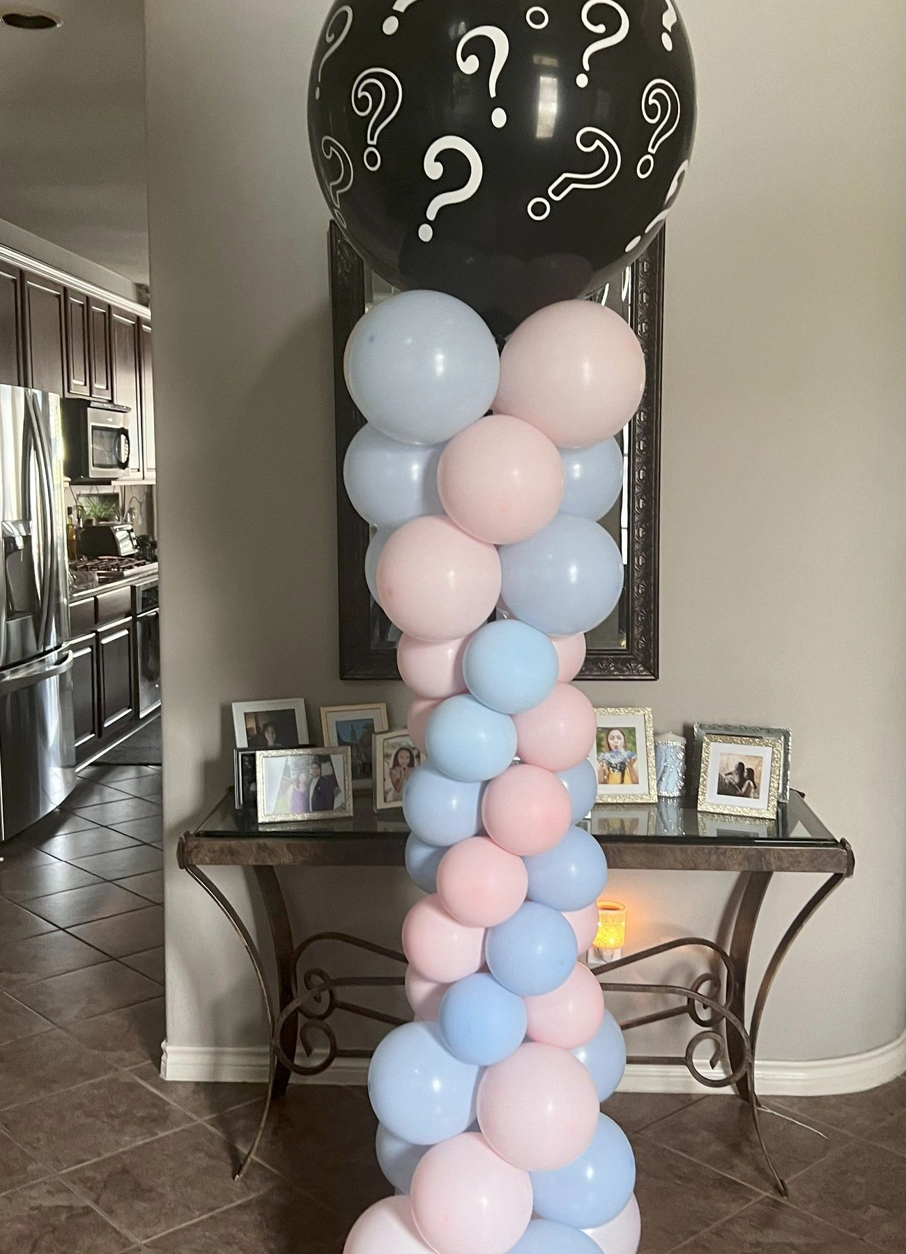 Gender reveal balloon column with question mark topper